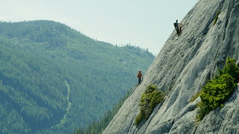 Aerial of team expedition of adventure climbers climbing Mt Habrich in Squamish area Canada RED WEAPON