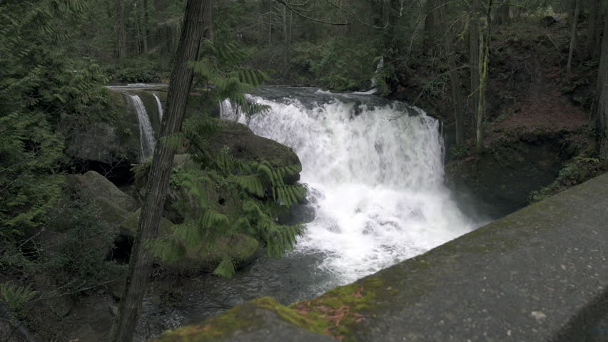 Whatcom Falls, Bellingham WA 4K UHD. 
Whatcom Falls roar with water. In the Pacific Northwest city of
Bellingham, Washington. 4K. UHD.
