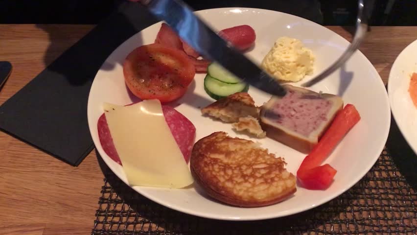 A gentleman enjoying a buffet-style breakfast, Rovaniemi, Finland