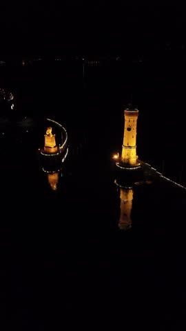 Lindau Harbour by night. Magic, epic images of light tower at a picturesque dreamy night. Very rare to see without tourists.