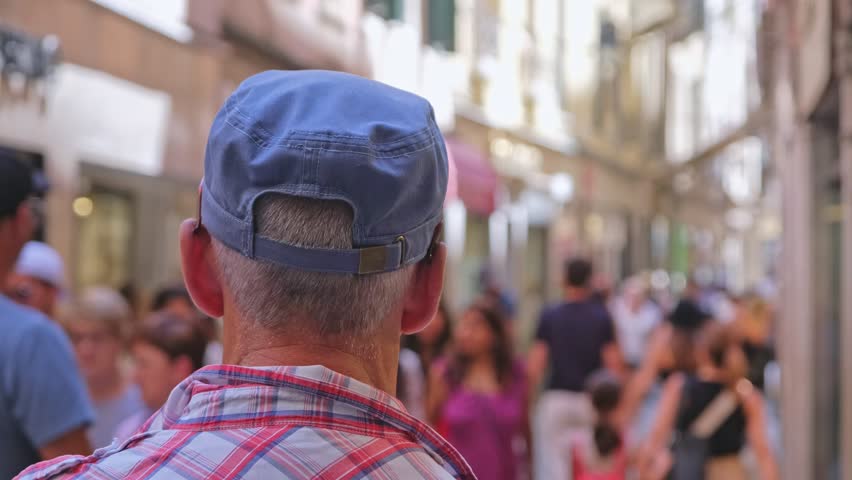 Middle Aged Disoriented Caucasian Male Tourist Watching Anonymous Crowd in Narrow Venice Street during Summer Vacation Season Royalty-Free Stock Footage #3465169959