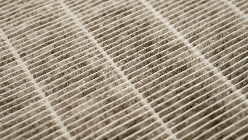 Air filter HEPA macro close up for removing fine particles and refresh indoor air. Air purifier filter for fresh healthy air, used for cleaning and removing allergen dust. Shallow depth of field. Royalty-Free Stock Footage #3465242387