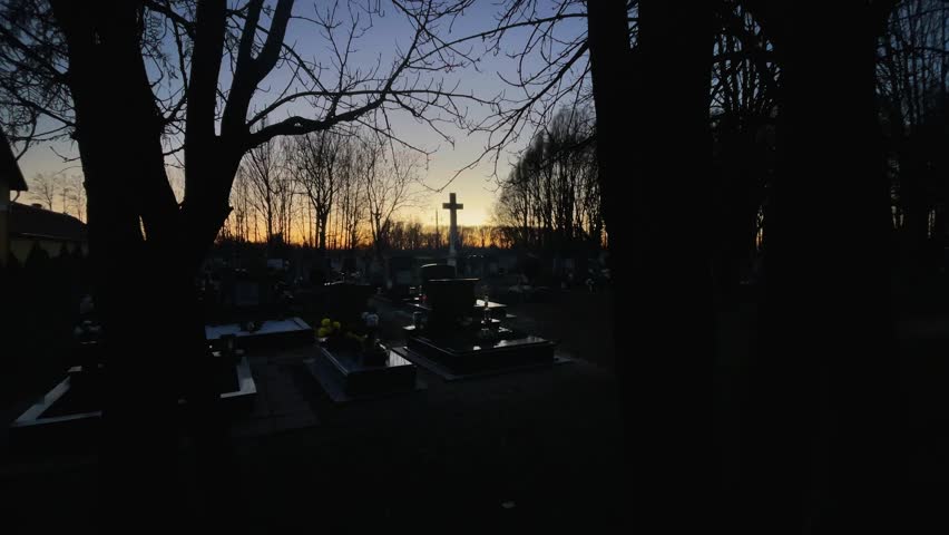 Graveyard Christian in evening with cross fish eye wide, Mosonmagyarovar, Hungary