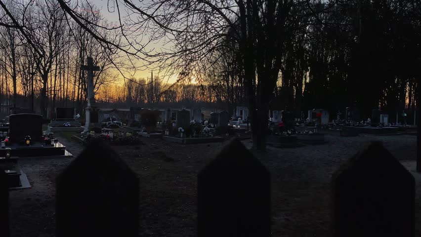 Graveyard Christian in evening with cross, Mosonmagyarovar, Hungary