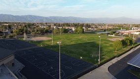 4k Aerial Video of Basketball Courts and Softball Fields on School Campus