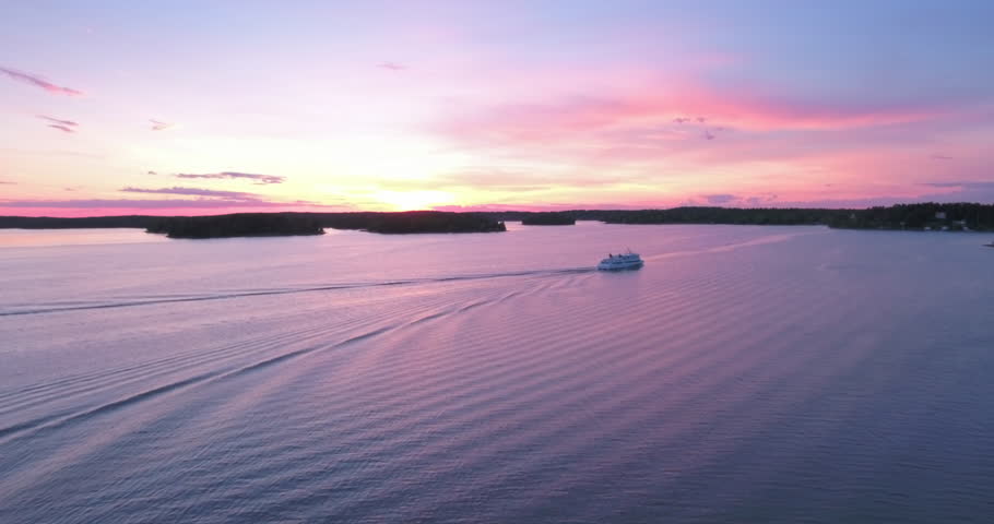 Aerial: As The Sun Dips Below The Horizon, Its Fiery Hues Are Mirrored In The Still Waters Of The Archipelago, Crafting A Tapestry Of Tranquility - Stockholm, Sweden
