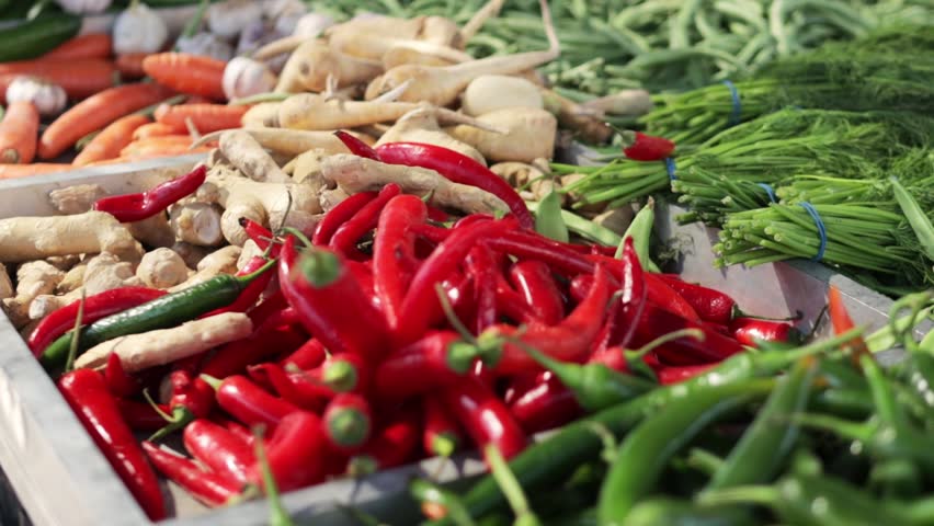 Farmer market, close-up assorted greens on display, concept of healthy eat and importance of incorporating fresh vegetables into one's diet. Royalty-Free Stock Footage #3465948021