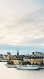 Stockholm, Sweden. Scenic View Of Stockholm Skyline At Summer Evening. Popular Destination Scenic Place In Dusk Lights. Riddarholm Church In Day To Night Transition Time Lapse. Vertical Footage Video.
