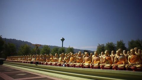 Buddha and massive apostles statue