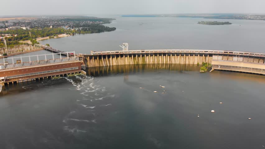 A beautiful view from above of the largest hydroelectric power plant in Ukraine - the Dnieper Hydroelectric Power Station. Dneproges before the shelling of Russian troops. Top view city of Zaporozhye.