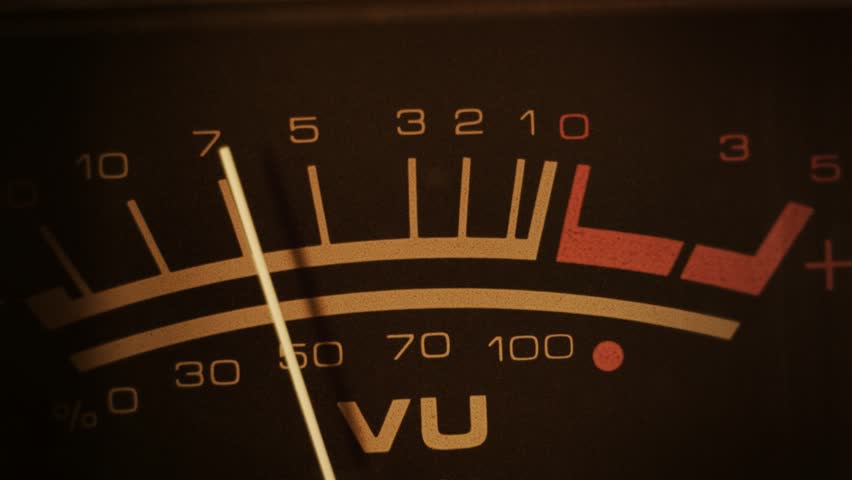 VU meter. Macro shot of a studio volume meter. Symbol of music production, recording and live show broadcasting. A pro equipment video loop, with natural colors. Ideal also for intros or logos