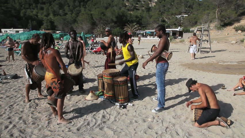 IBIZA, EIVISSA JUN 10, 2009: Drummer at the beach in Ibiza at daytime on June
