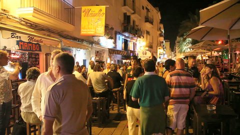 IBIZA, EIVISSA JUN 10, 2009: Tourists at night at the famous Bar Mambo on June 10, 2009 in Eivissa, Ibiza, Spain
