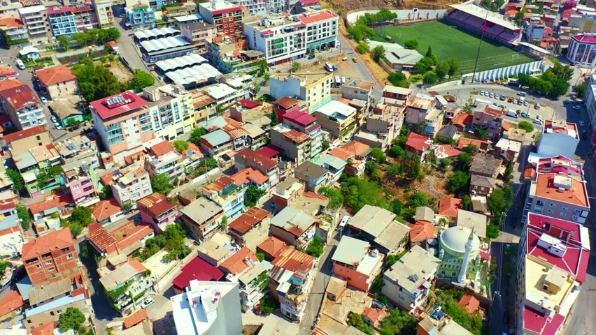 aerial view of izmir cityscape with skyscrapers, buildings, port and sea flag coast