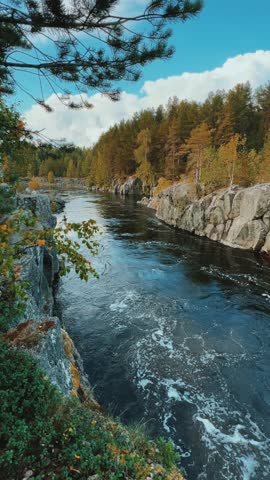 Canyon of the Nizhny Vyg river, near the Padun waterfall. A river gorge with rocks and greenery. Not far from the White Sea-Baltic Canal. Karelia, Russia 4K