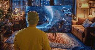 A Man Standing In Front Of A Tv In A Living Room Living Room Photorealism