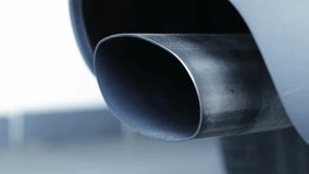 Close up of a car Exhaust fumes from the exhaust pipe pollution ecology background