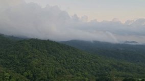Beautiful time lapse drone video of the clouds above a rainforest in from Costa Rica