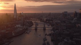 Magnificent Sunset, Inspiring Light, Establishing Aerial View Shot of London UK, United Kingdom, Shard, Tower Bridge, Tower of London