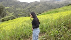 Among yellow flowers an attractive girl, The Radiant Essence of a Healthy Life, outdoors, lifestyle, black t-shirt, healthy lifestyle