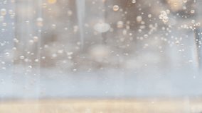 Golden Bubbles Rotate in Transparent Water and Settle to the Bottom, Macro. - Powered by Shutterstock - Get 15% off with code: PIKWIZARD15