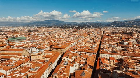 Florence, Tuscany, Italy seen from above, reveals a tapestry of picturesque architecture, weaving history and beauty under the Italian sun
 Stockvideó