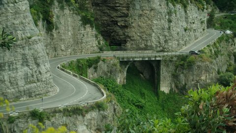 Car driving along a road on the Amalfi Coast