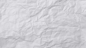 Stop motion animation paper texture background. 4k looping animation of crumpled white paper. template video HD