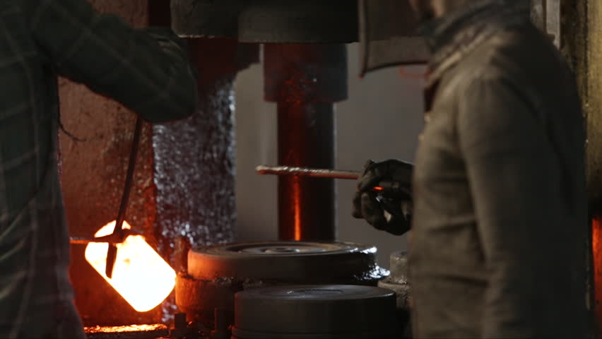 hot press drop forging metal piece shaping drop hammer to give it a tool shape. Open die forging hit by hammer on a tool mould cast to form a machine component part isothermal annealing factory Royalty-Free Stock Footage #3467543025