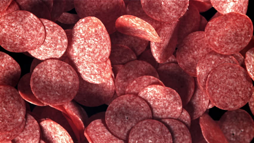 Sliced salami flies up and falls down. Filmed on a high-speed camera at 1000 fps. High quality FullHD footage