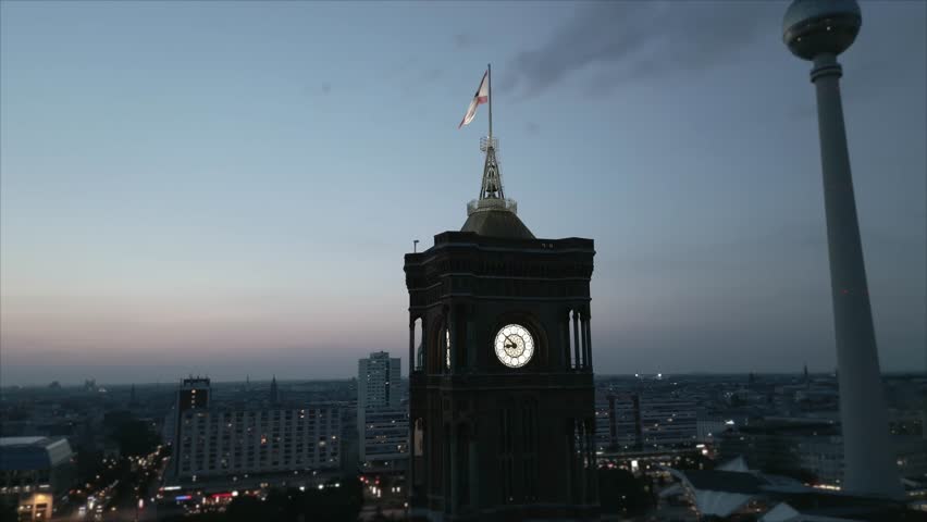 Night Aerial shot of Berlin town hall clock at Alexanderplatz Germany