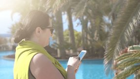 High quality video of woman serfing the net on the vacations in real 1080p slow motion 120fps
