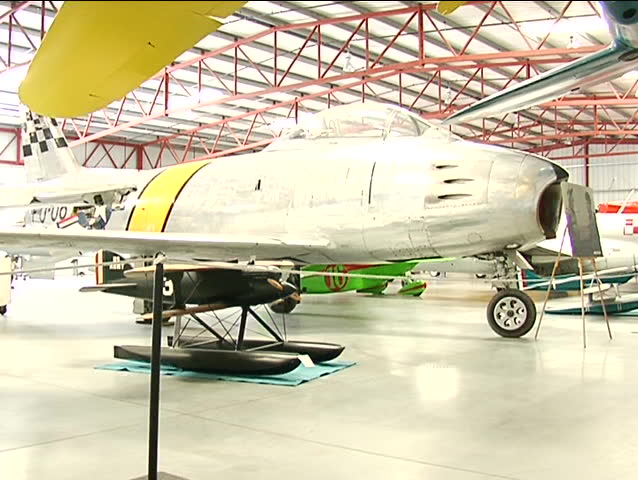 Korean War Jet in hanger. Right  angle shot.