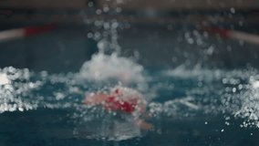 Workout Of Woman Swimmer In Swimming Pool, Slow Motion Portrait Of Young Adult Sportswoman - Powered by Shutterstock - Get 15% off with code: PIKWIZARD15