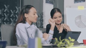 Indian smiling young adult woman business talking break time together indoor workplace. Teen age female corporate sitting on office chair colleague speak group nodding listening gossip modern company  - Powered by Shutterstock - Get 15% off with code: PIKWIZARD15