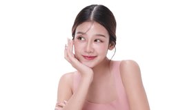Close up portrait beautiful young Asian woman with healthy facial skin isolated over white background. - Powered by Shutterstock - Get 15% off with code: PIKWIZARD15