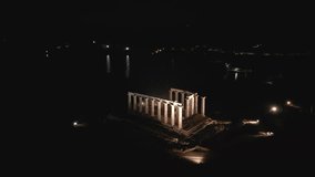 Aerial of the Temple of Poseidon in the evening on Cape Sounion, Greece