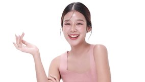 Close up portrait beautiful young Asian woman with healthy facial skin isolated over white background. - Powered by Shutterstock - Get 15% off with code: PIKWIZARD15