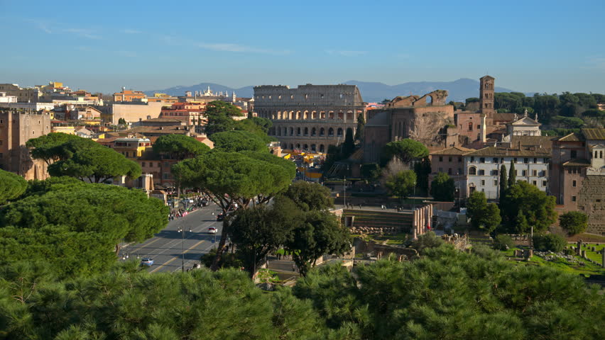 Distant view of the Colosseum with city view in the background, Rome, Italy