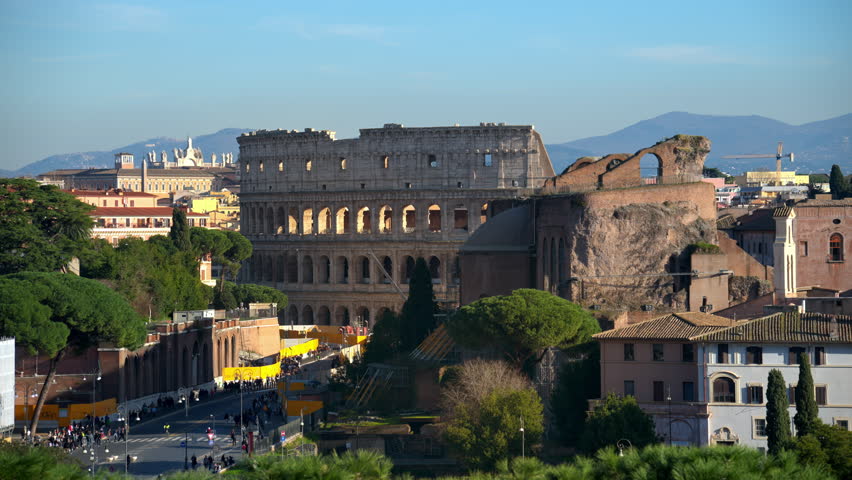 Distant view of the Colosseum with city view in the background, Rome, Italy