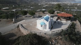 Aerial video above a small church on the island of Crete, Greece