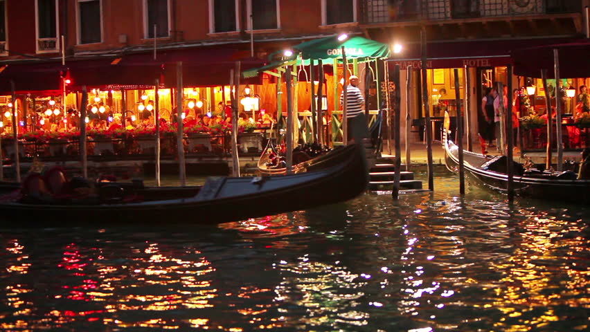 VENICE - CIRCA MAY 2012: Stationary shot of floating gondolas
