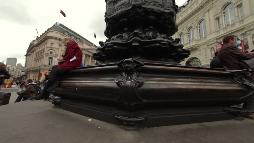 LONDON - OCTOBER 7, 2011: Lower half of the Eros Statue at Piccadilly Circus in