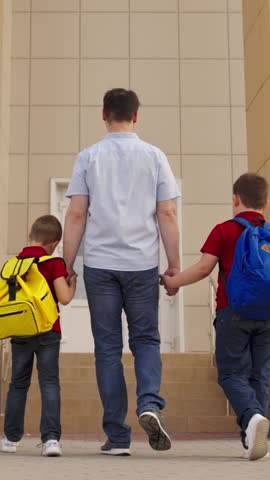 father leads child boy son with backpack school holds hand happy family, guidance, brotherhood, family unity, learning journey, father's love, academic preparedness, parenting duties, enthusiastic Royalty-Free Stock Footage #3468591765