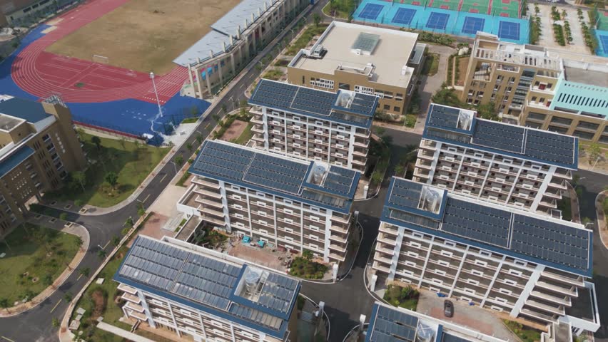 new primary and secondary school, sports complex, residential complex, sports ground, China. Top view of the new stadium. Open stadium. Chinese sports infrastructure