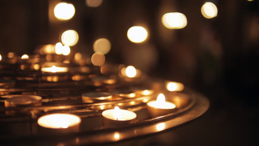Close up of group of illuminated candles at Notre-Dame cathedral in Paris Royalty-Free Stock Footage #3468799281