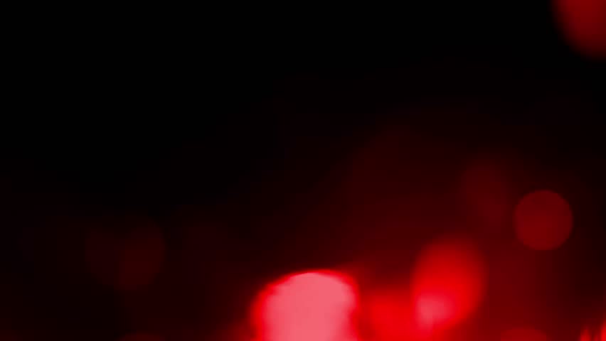 Red light glares on dark background Royalty-Free Stock Footage #3468864297