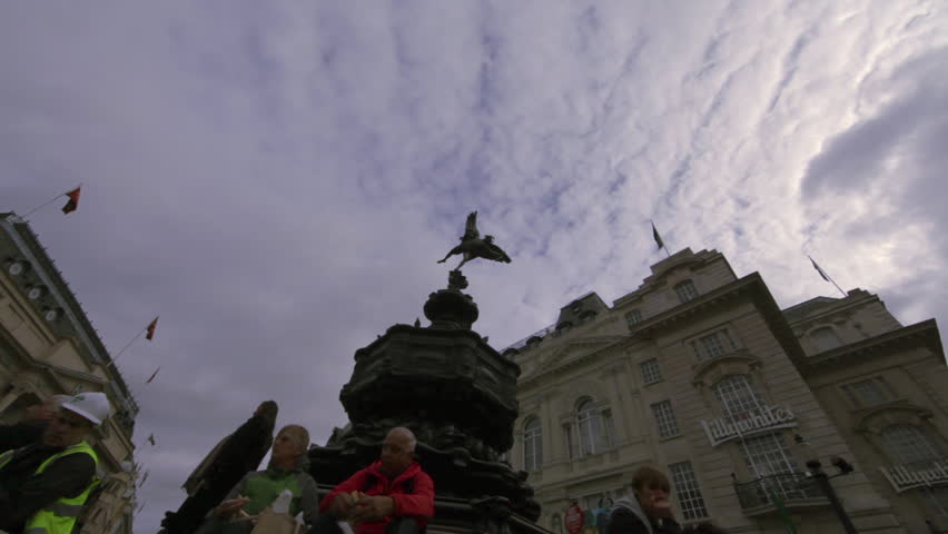 LONDON - OCTOBER 7, 2011: Time lapse as unidentified couple sit on the Eros
