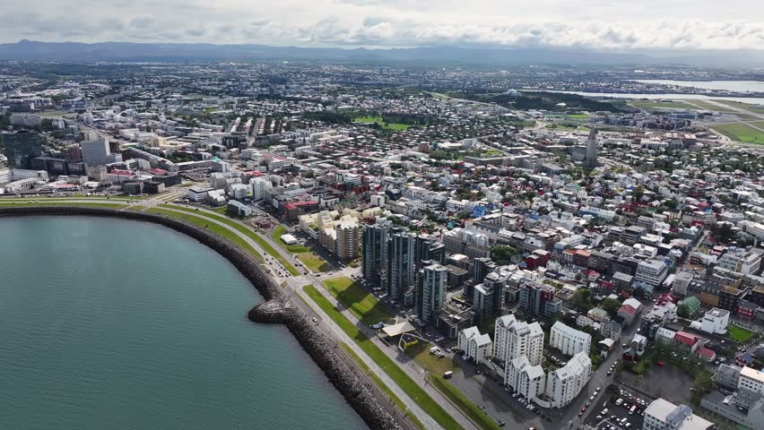 Reykjavik, Iceland. Aerial View of Cityscape Downtown Buildings and Coastal Road