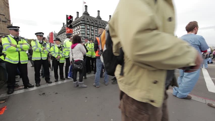 LONDON - OCTOBER 9, 2011: Police officers control an area near Westminster 